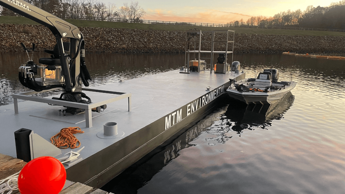 MTM Environmental barge operation platform on a reservoir